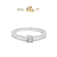 Csillogó briliáns díszíti ezt a női gyűrűt 14 k  fehér aranyból 