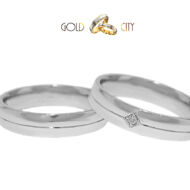 Modern karikagyűrű fehér aranyból, a női gyűrű kövekkel díszítve, 