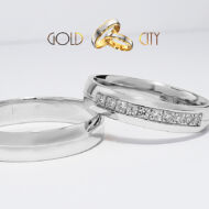 Modern karikagyűrű fehér aranyból, a női gyűrű kövekkel díszítve, 