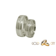 Modern, 14 karátos fehér arany karikagyűrű, a női változat csillogó kövekkel díszítve.