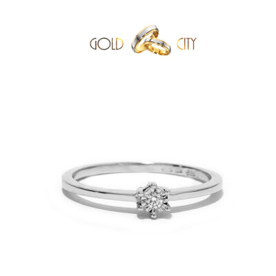 Csillogó briliáns díszíti ezt a női gyűrűt 14 k  fehér aranyból