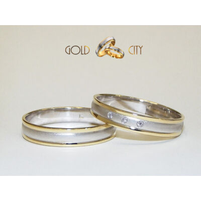 Kövekkel díszített modern karikagyűrű a Goldcity Ékszer Webáruházból