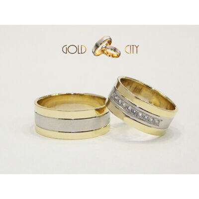 Széles sárga és fehér arany karikagyűrű, a nőiben 10 db kővel.
