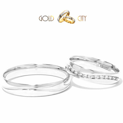 Fényes, 14 karátos modern fehér arany karikagyűrű. A női változat kövekkel