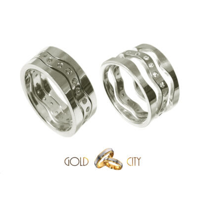 Három különálló karikából álló fehér arany karikagyűrű, a női változat kövekkel díszítve.