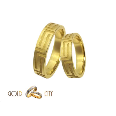 Mélyen mart mintával díszített 14 karátos sárga arany karikagyűrű