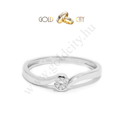Csillogó briliáns díszíti ezt a női gyűrűt 14 k  fehér aranyból 