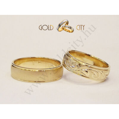 Kézzel vésett 14 karátos sárga aranyból készült karikagyűrű.