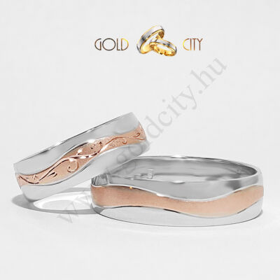 Karikagyűrű 14 karátos aranyból, a női gyűrű kézi véséssel díszítve.