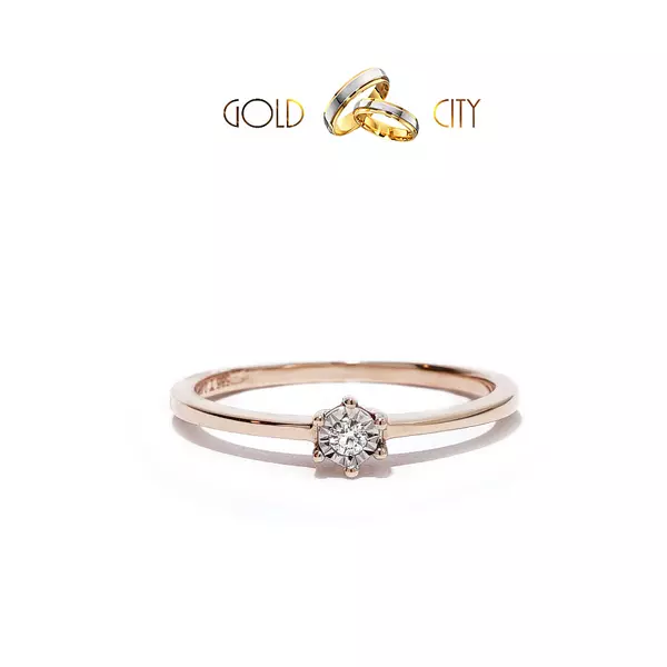 Csillogó briliáns díszíti ezt a női gyűrűt 14 k  rozé aranyból