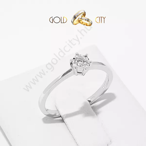 Briliáns csiszolású gyémánt díszíti ezt a klasszikus stílusú női gyűrűt