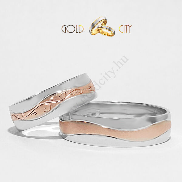 Karikagyűrű 14 karátos aranyból, a női gyűrű kézi véséssel díszítve.